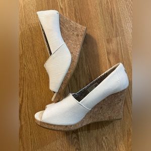 Tom’s cream color wedges
